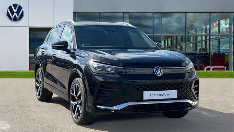 Deep black pearl Used 2024 VW Tiguan R-line SUV | £36,198 (Expensive) - Image 1/4