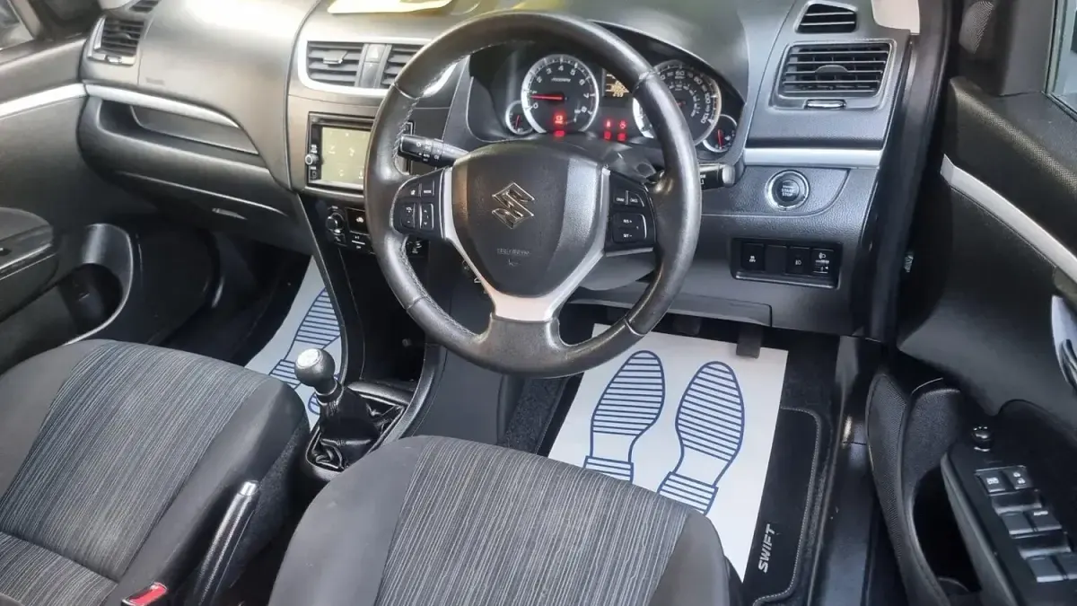 Usado Suzuki Swift SZ4 94 HP (69 kW) 2014 Cinzento Citadino