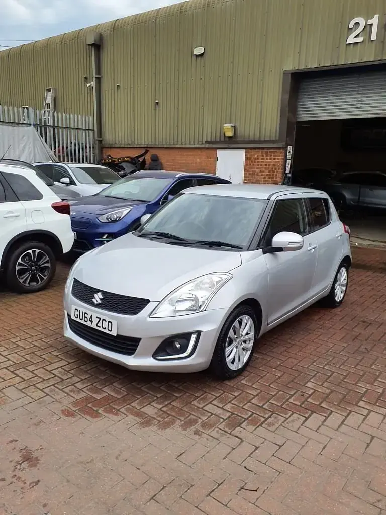 Usado Suzuki Swift SZ4 94 CV (69 kW) 2014 Plateado Utilitario