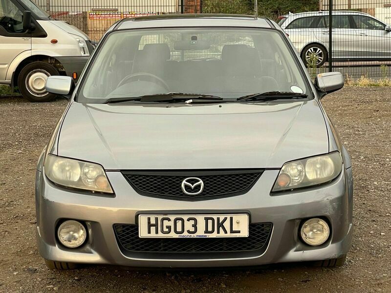 Used Mazda 323 Inclusive 129 HP (94 kW) 2002 Silver Hatchback