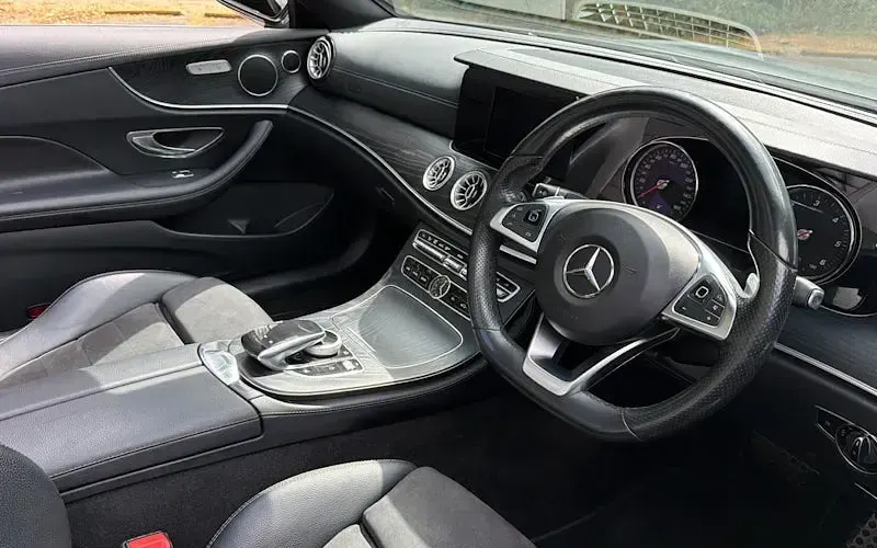 Used Mercedes E220 AMG line 194 HP (142 kW) 2018 Grey Cabriolet