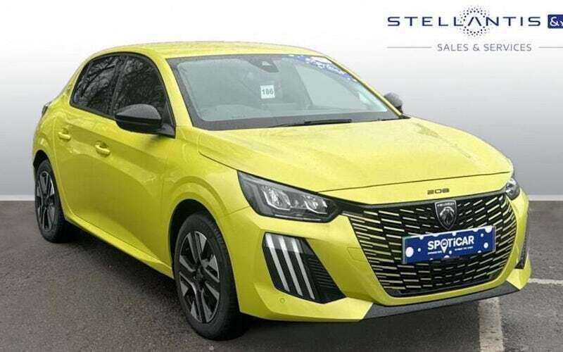 Yellow Used 2024 Peugeot e-208 Style Hatchback | £20,700 (Expensive) - Image 1/4