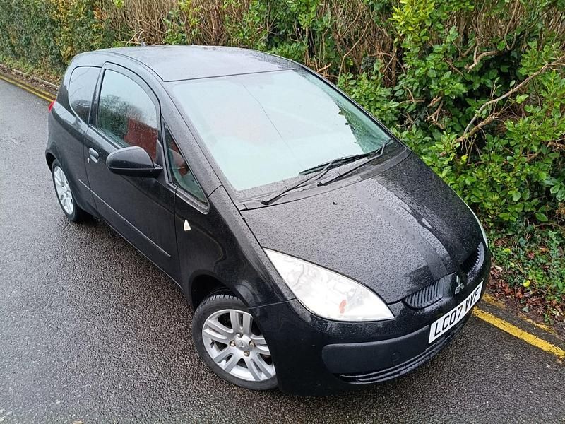 Usado Mitsubishi Colt 75 HP (55 kW) 2007 Preto Citadino