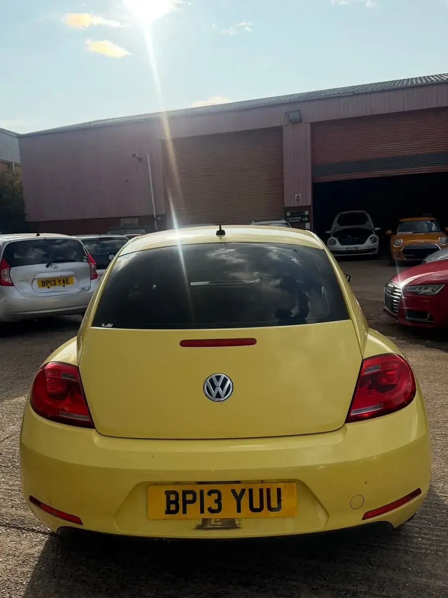 Used VW Beetle 105 HP (77 kW) 2013 Yellow Hatchback