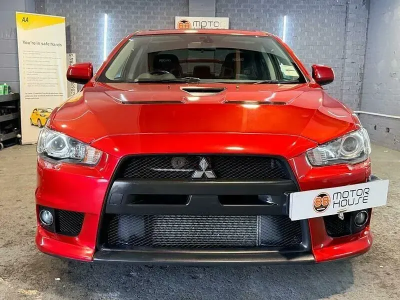 Used Mitsubishi Lancer 290 HP (213 kW) 2009 Red Sedan