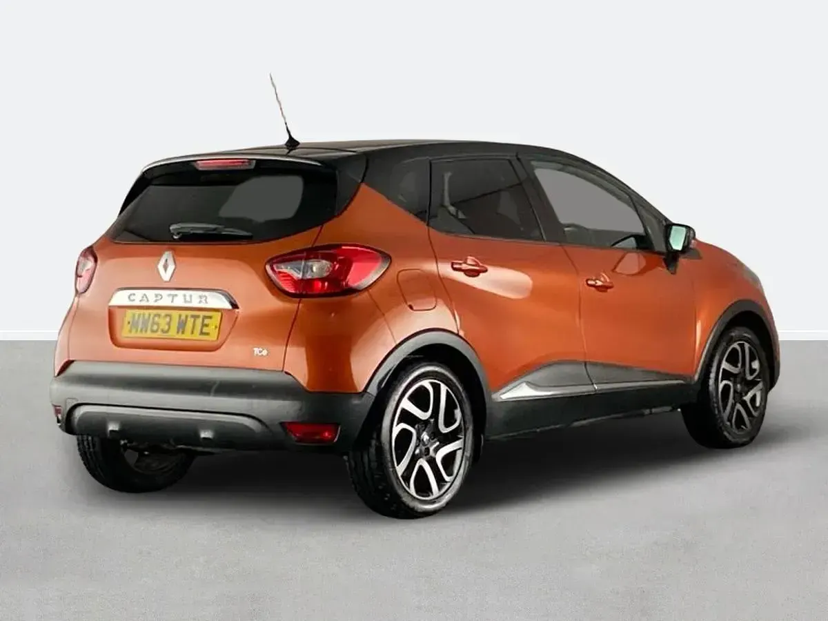 Used Renault Captur Dynamique 90 HP (66 kW) 2014 Orange/black SUV