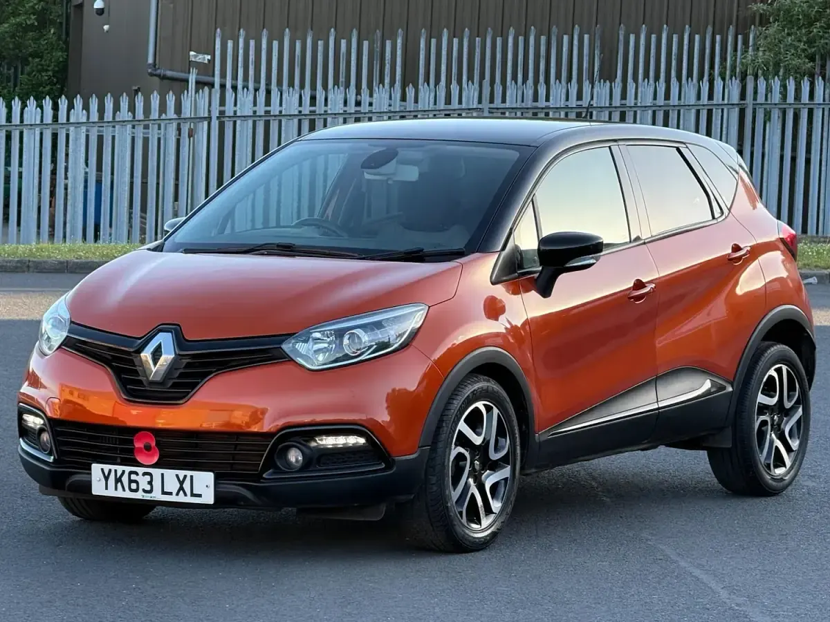 Used Renault Captur Dynamique 90 HP (66 kW) 2013 Orange/black SUV