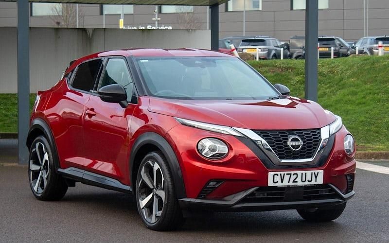 Used Nissan Juke Tekna 114 HP (83 kW) 2023 Fuji sunset red SUV