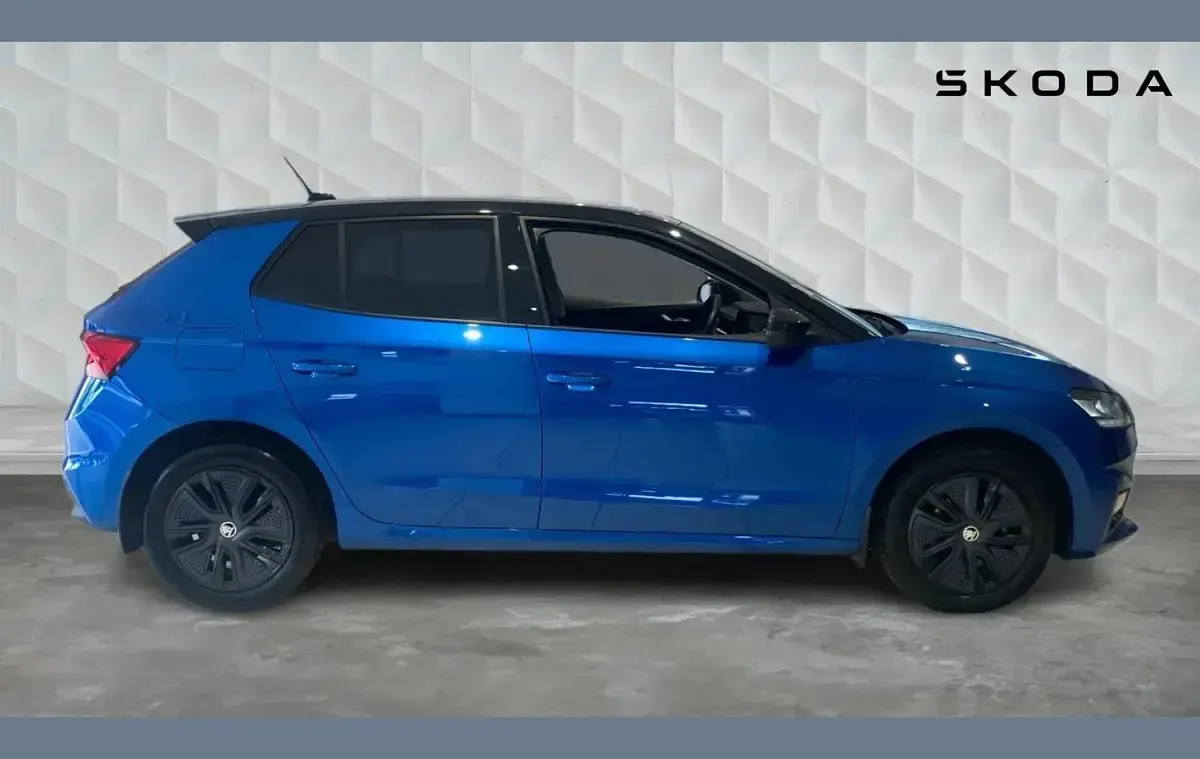 Used Skoda Fabia Design Edition 94 HP (69 kW) 2024 Race blue metallic black magic pearl effect Hatchback