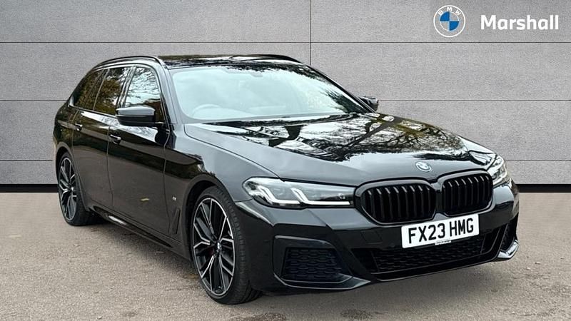 Black sapphire Used 2023 BMW 520 M Sport Estate | £32,798 (Fair price) - Image 1/4