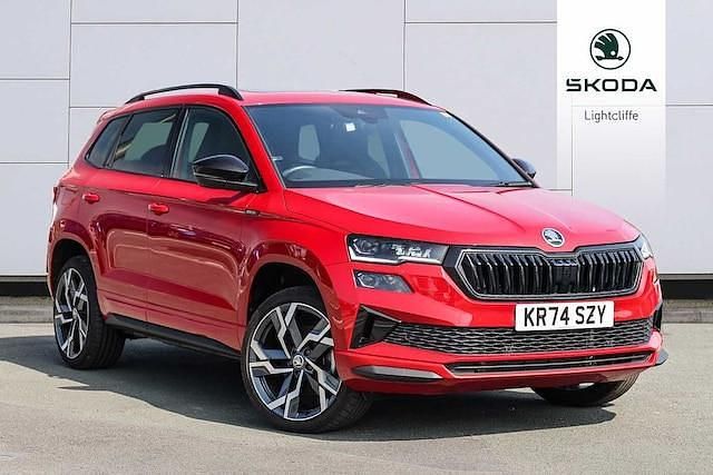 Velvet red metallic Used 2024 Skoda Karoq SportLine SUV | £30,290 (Fair price) - Image 1/4