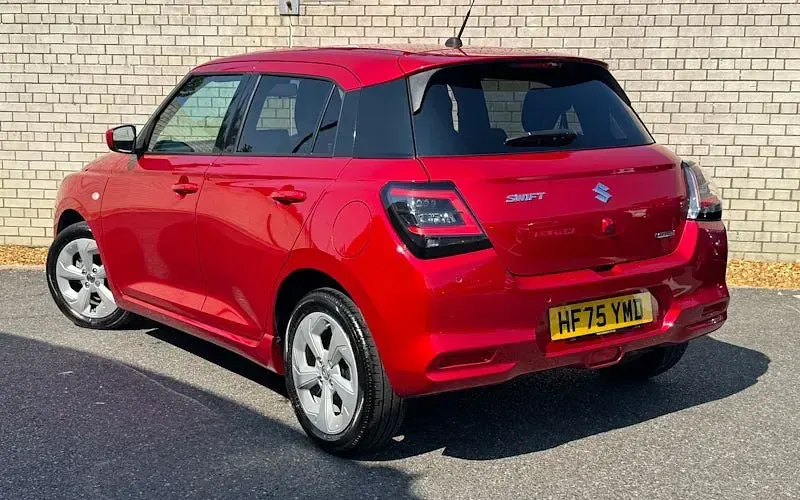 Used Suzuki Swift 82 HP (60 kW) 2025 Burning red pearl Hatchback