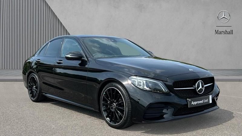 Obsidian black metallic Used 2021 Mercedes C220 AMG line Sedan | £28,480 - Image 1/4