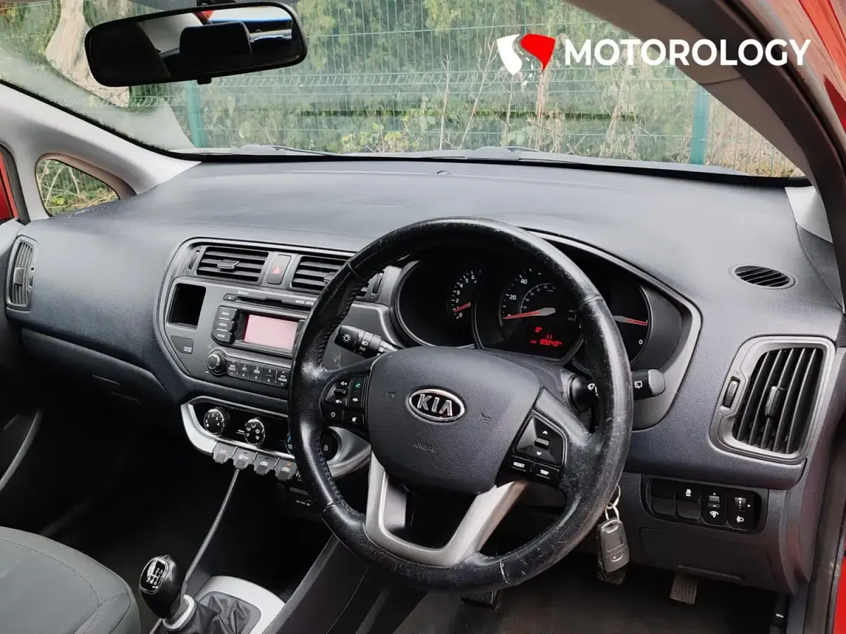 Usado Kia Rio 107 CV (78 kW) 2012 Rojo Utilitario