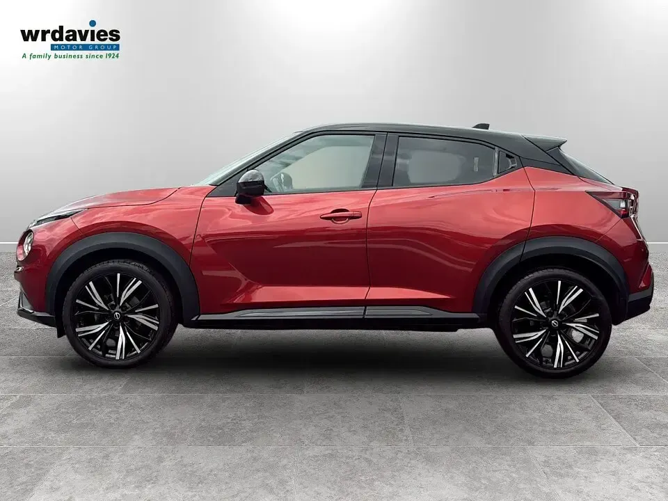 Used Nissan Juke Tekna+ 114 HP (83 kW) 2022 Fuji sunset red SUV