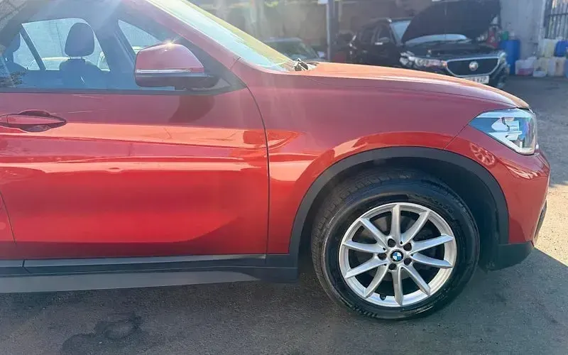 Used BMW X1 140 HP (102 kW) 2018 Orange SUV