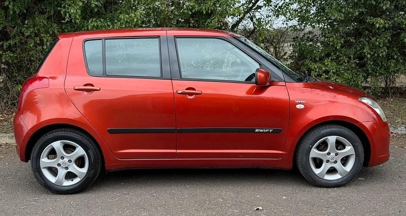 Used Suzuki Swift GLX 102 HP (75 kW) 2006 Orange Hatchback