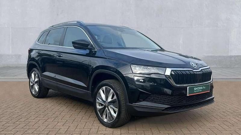 Black magic pearlescent Used 2024 Skoda Karoq SE L SUV | £20,490 (Fair price) - Image 1/4