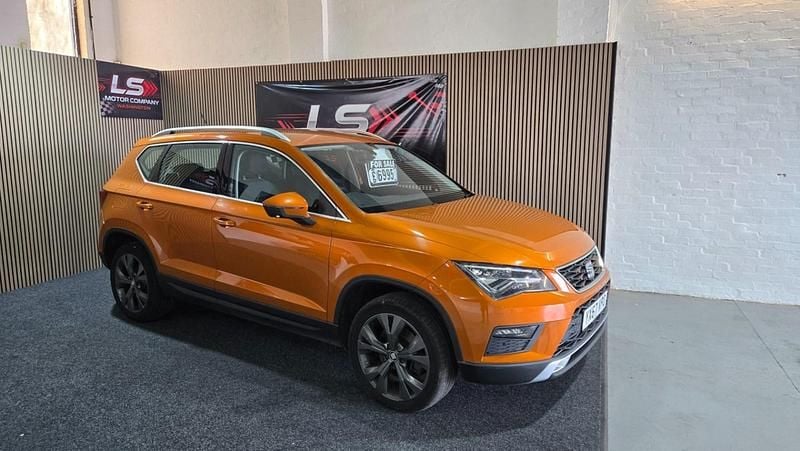 Second-hand Seat Ateca Ecomotive 115 CP (84 kW) 2017 Portocaliu SUV
