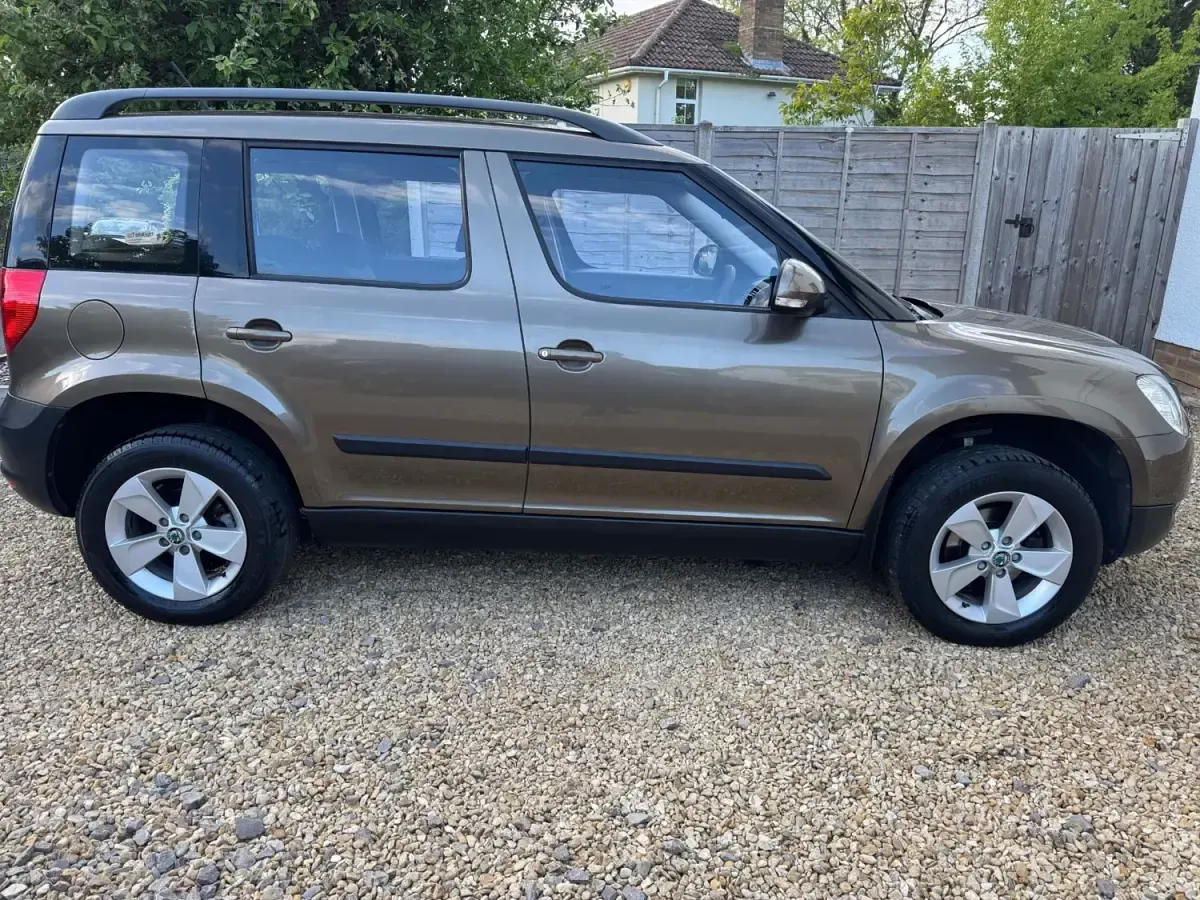 Używany Skoda Yeti 105 KM (77 kW) 2011 Brązowy SUV
