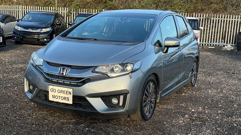 Used Honda Fit Hybrid 137 HP (100 kW) 2015 Sliver Hatchback