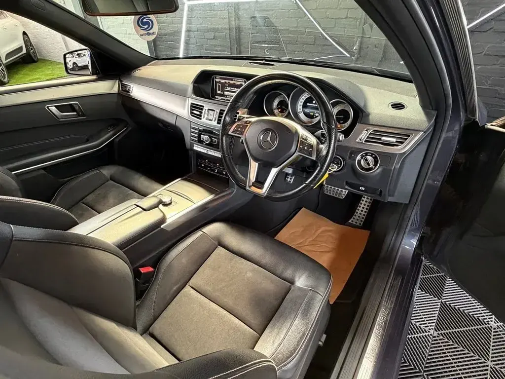 Used Mercedes E220 AMG line 177 HP (130 kW) 2015 Blue Estate