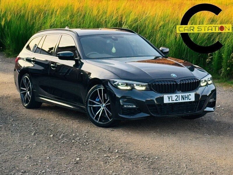 Black sapphire metallic paint Used 2021 BMW 320e M Sport Estate | £20,495 - Image 1/4