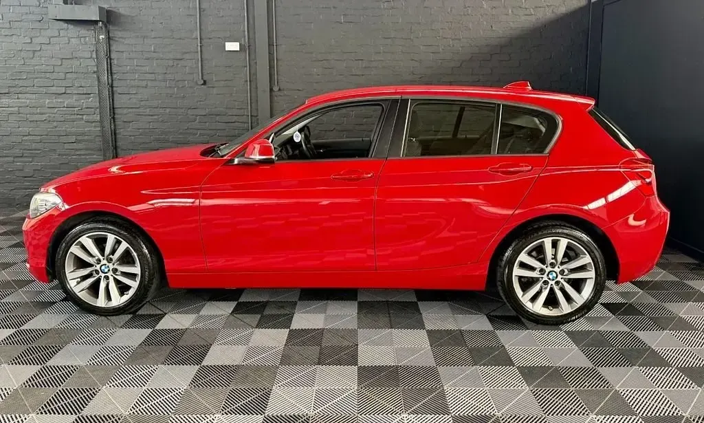 Używany BMW 118 Sport Line 150 KM (110 kW) 2017 Czerwony Hatchback
