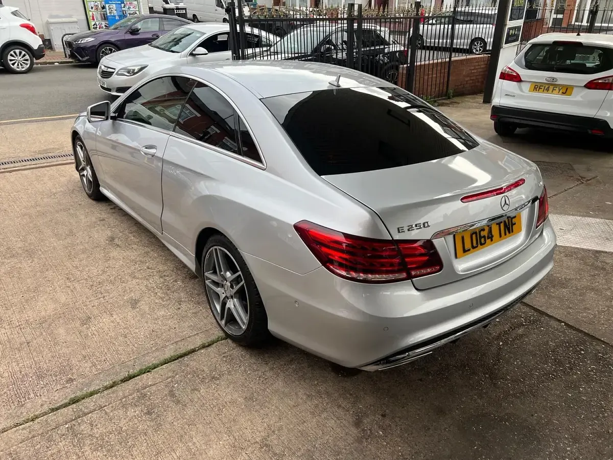 Used Mercedes E250 AMG line 204 HP (150 kW) 2014 Silver Coupe