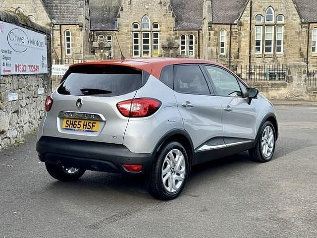 Used Renault Captur Dynamique 90 HP (66 kW) 2015 Silver/orange SUV