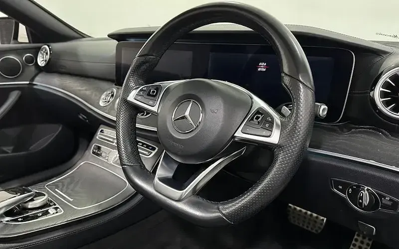 Used Mercedes E220 AMG Line Premium 194 HP (142 kW) 2018 White Cabriolet
