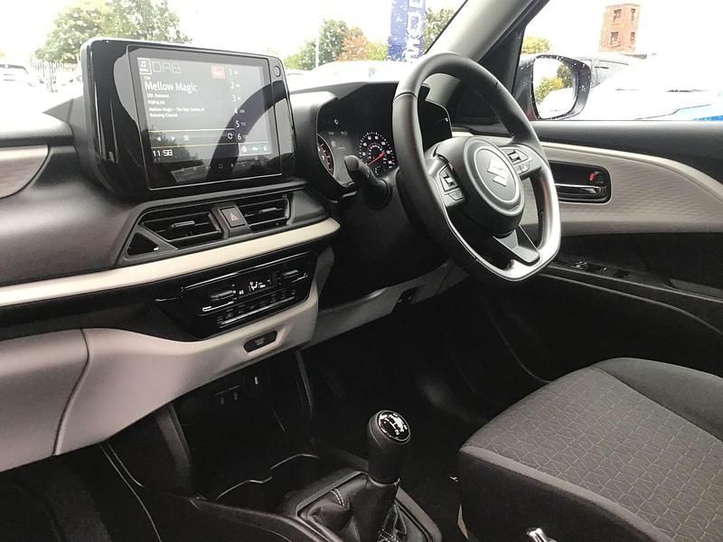 Used Suzuki Swift 82 HP (60 kW) 2025 Premium metallic  burning red pearl Hatchback