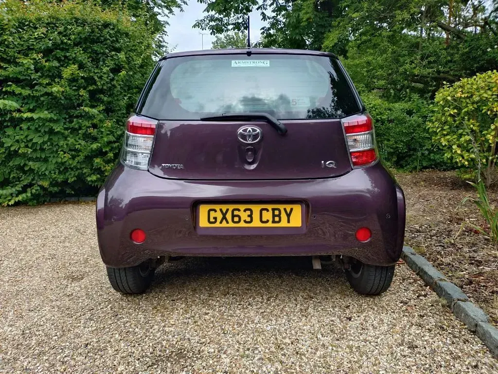 Used Toyota iQ 68 HP (50 kW) 2013 Amethyst pearl Hatchback