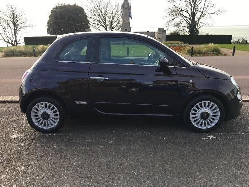 Usado Fiat 500 Lounge 85 HP (62 kW) 2014 Roxo Citadino