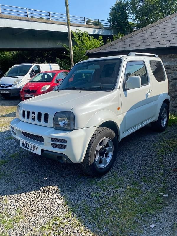 Used Suzuki Jimny SZ4 85 HP (62 kW) 2012 White SUV