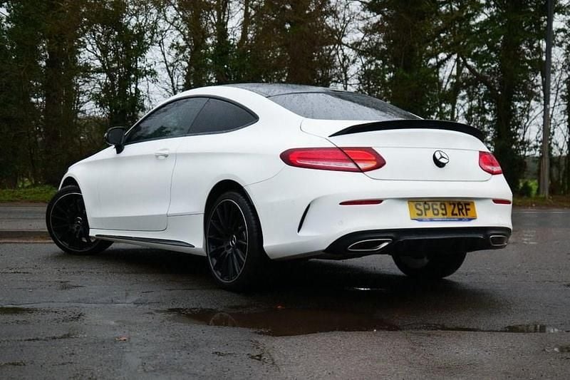 Used Mercedes C180 AMG line 156 HP (114 kW) 2019 White Coupe