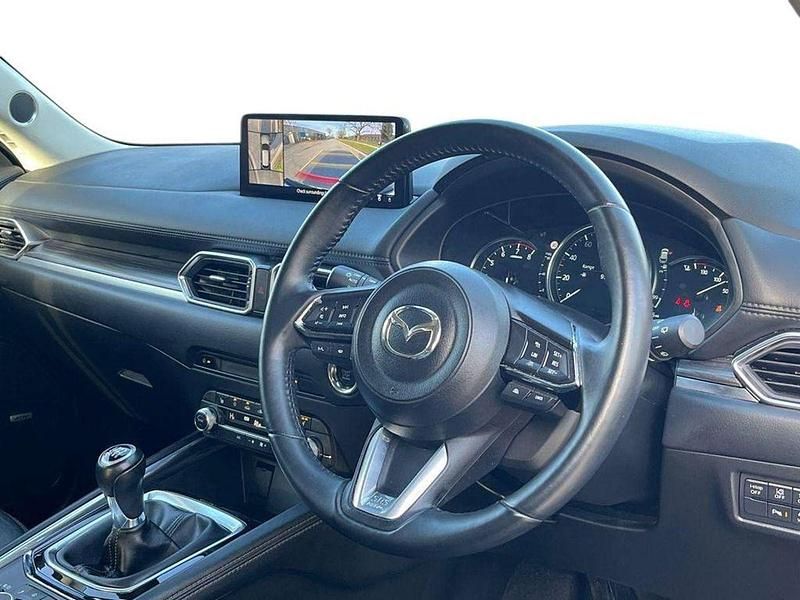 Usado Mazda CX-5 Exclusive-Line 165 HP (121 kW) 2023 Cinzento SUV
