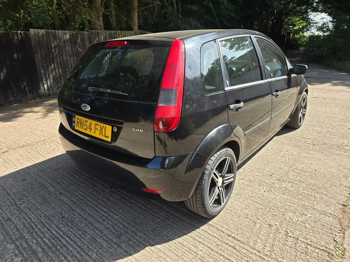 Used Ford Fiesta Ghia 100 HP (73 kW) 2005 Black Hatchback