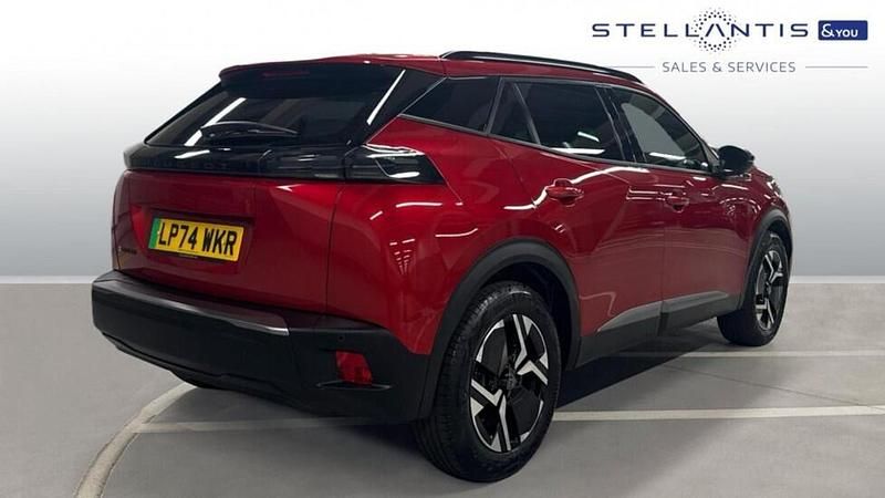 Używany Peugeot e-2008 Allure 98 kW (134 KM) 2025 Czerwony SUV