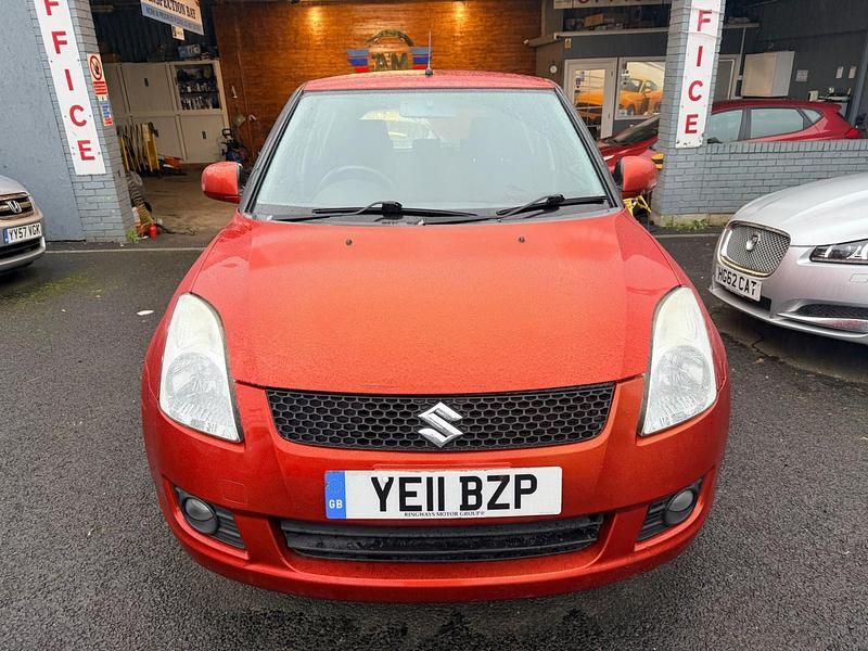 Used Suzuki Swift SZ4 101 HP (74 kW) 2011 Orange Hatchback
