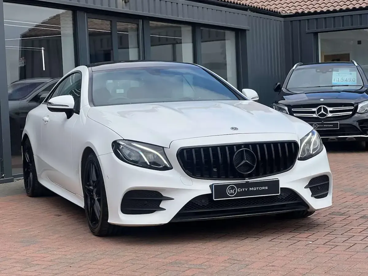 Used Mercedes E220 AMG line 194 HP (142 kW) 2018 White Coupe