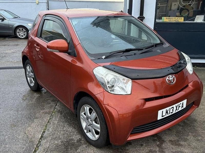 Used Toyota iQ 68 HP (50 kW) 2013 Orange Hatchback