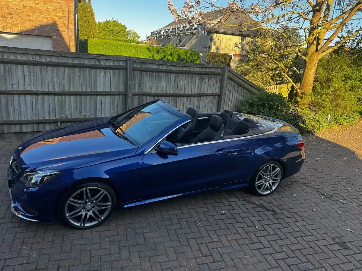 Used Mercedes E220 AMG line 177 HP (130 kW) 2016 Blue Cabriolet