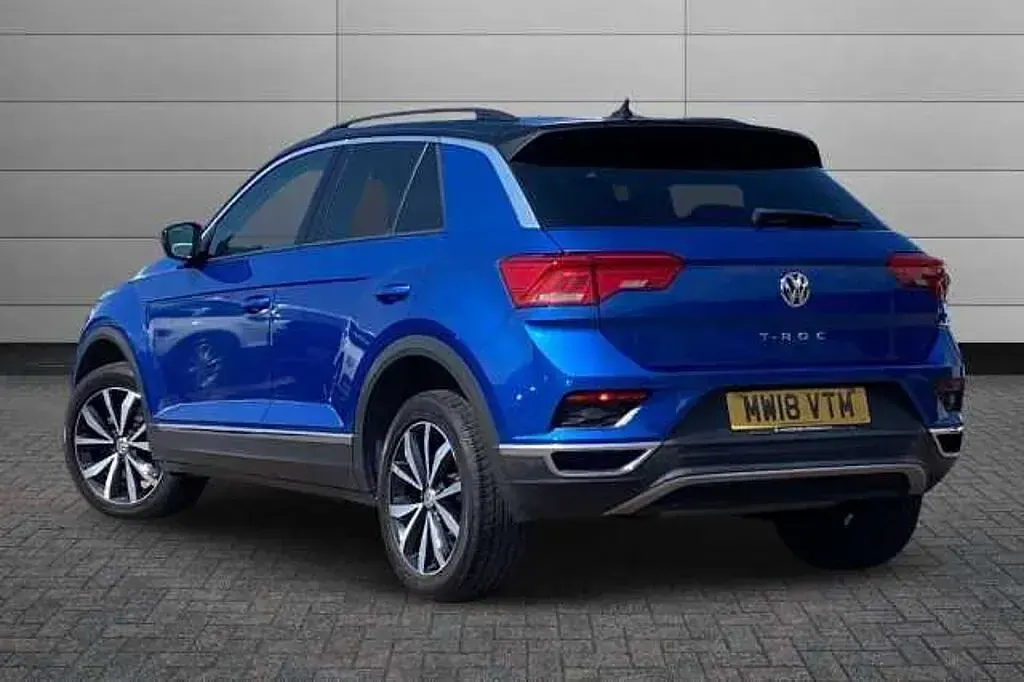Used VW T-Roc Design 150 HP (110 kW) 2018 Ravenna blue with black roof SUV