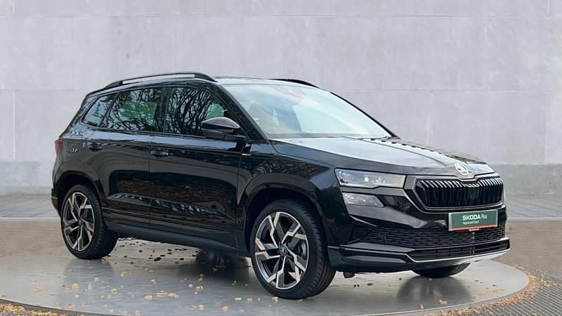 Black magic pearl effect New 2025 Skoda Karoq SportLine SUV | £32,990 (Super price) - Image 1/4