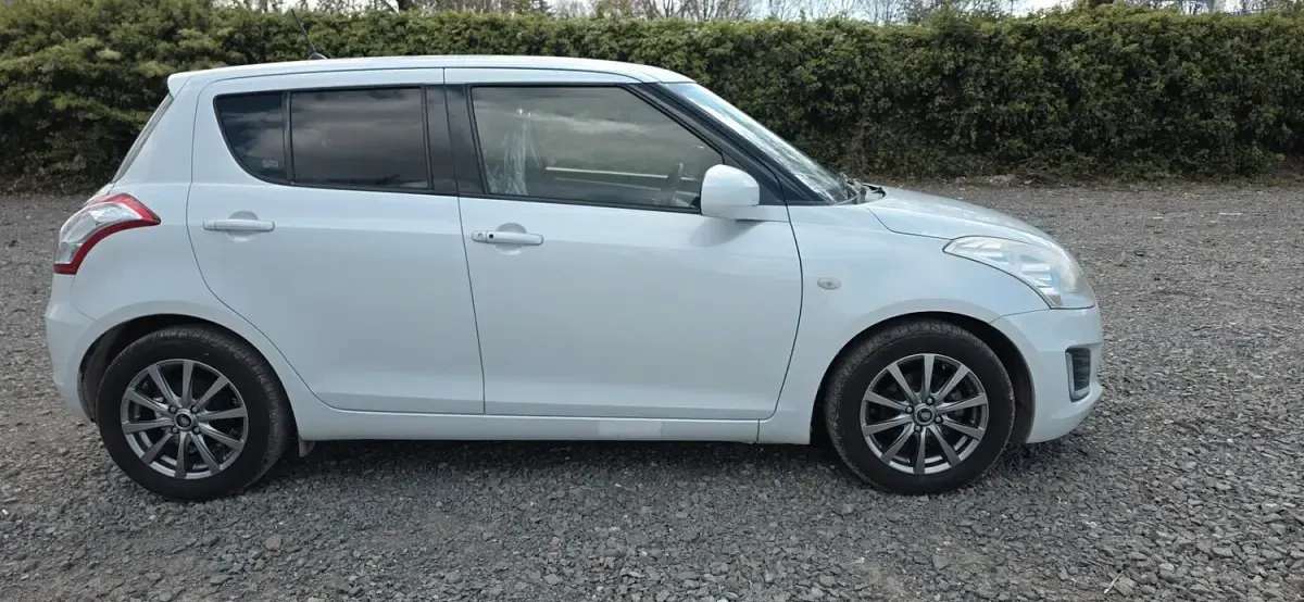 Used Suzuki Swift 94 HP (69 kW) 2015 Silver Hatchback