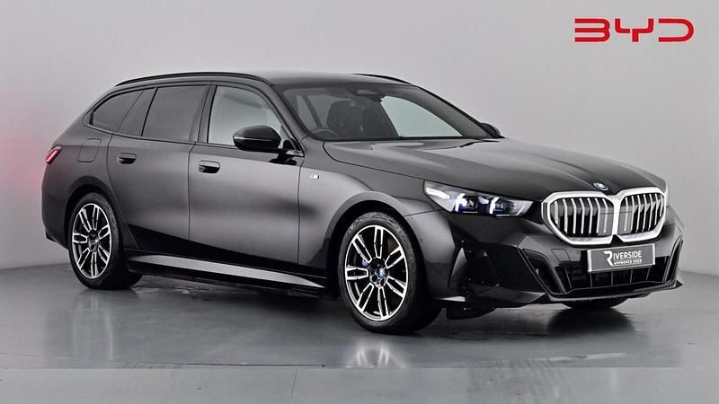 Obsidian black Used 2024 BMW i5 M Sport Estate | £41,485 (Fair price) - Image 1/4