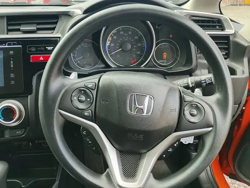 Used Honda Jazz SE 102 HP (75 kW) 2017 Orange Hatchback