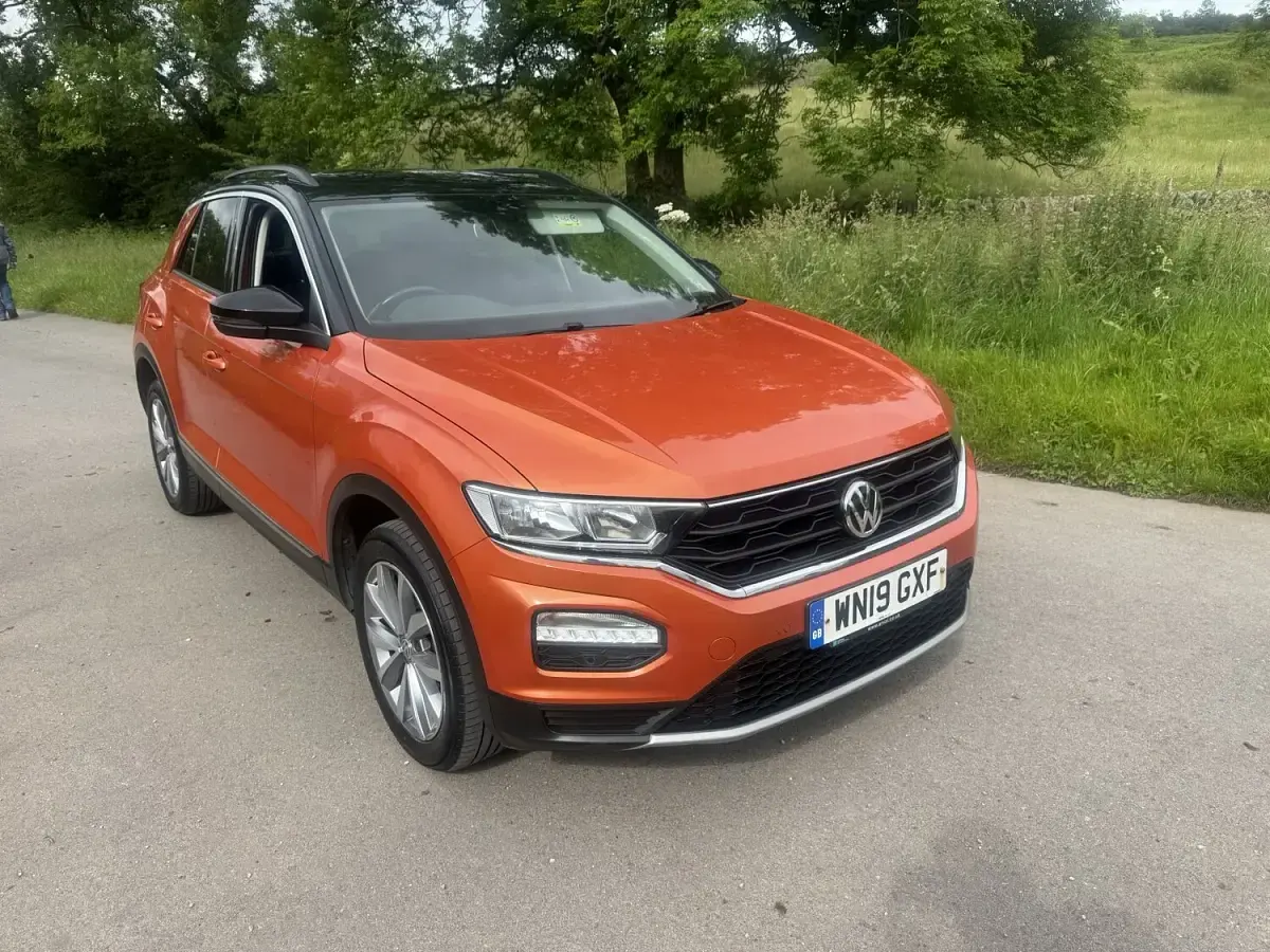 Used VW T-Roc Design 115 HP (84 kW) 2019 Orange SUV