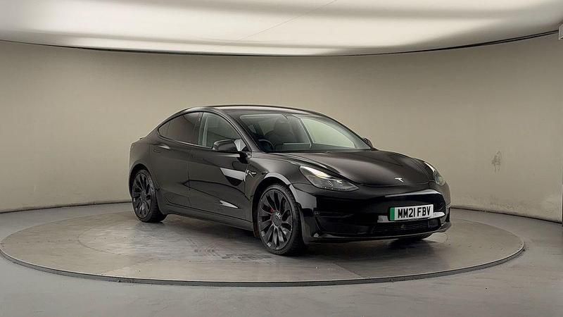 Solid black Used 2021 Tesla Model 3 Performance Sedan | £23,450 (Fair price) - Image 1/4